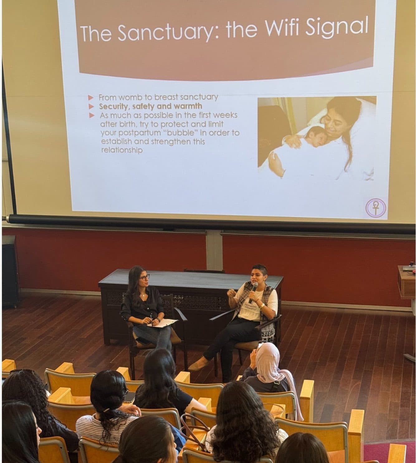 An Attachment Conversation in a lecture hall at AUC